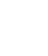 icon of a person working at a desk with a computer. 