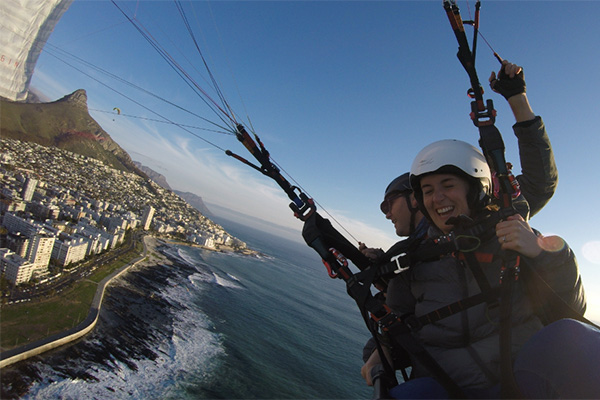 ANI employee enjoying a tandem parachute jump. 