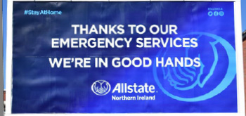 A billboard that says - Thanks to our emergency services- We're in Good Hands - Allstate Northern Ireland. 