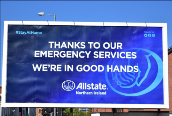 A billboard thanking the emergency services, we're in Good Hands - Allstate Northern Ireland. 